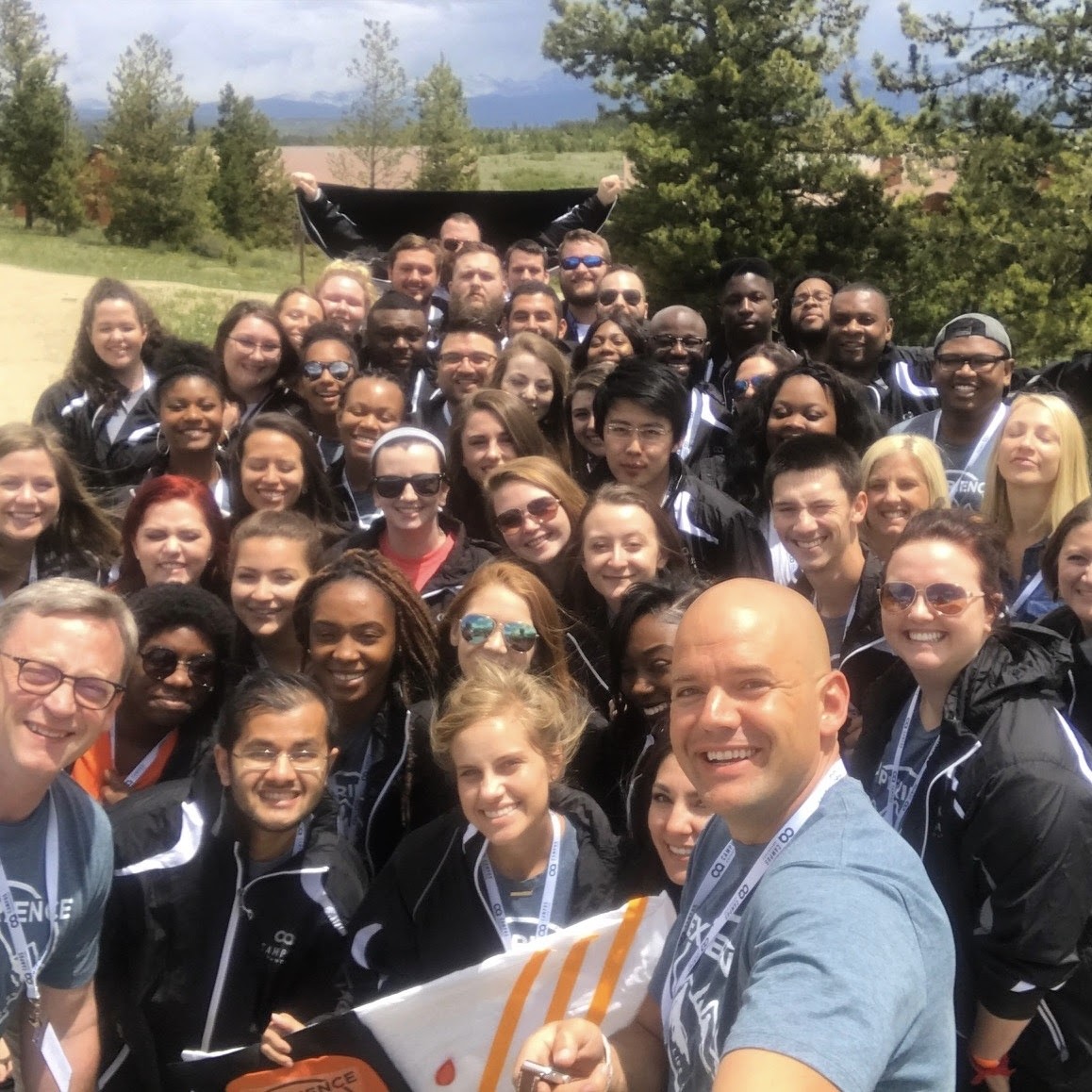 Dan with a large team at a retreat